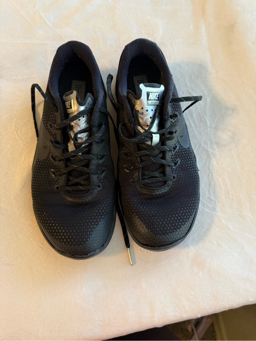 Nike Men’s Black Sneakers with Silver Tongue Accents